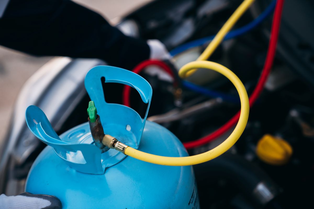 Hvac Contractor Working On A Refrigerant Change In Wichita Ks