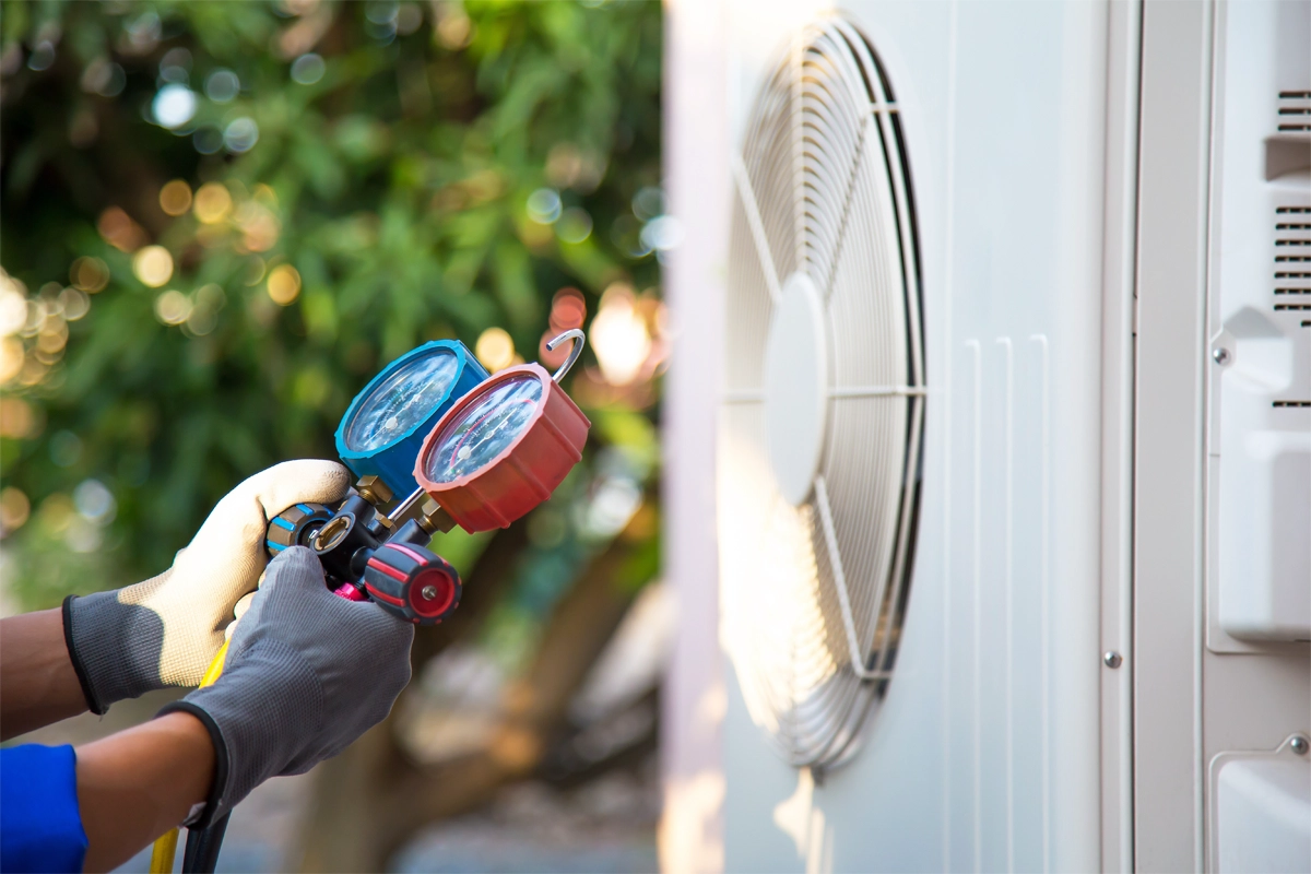 Hvac Technician Testing For Air Conditioner Noises In Wichita Ks